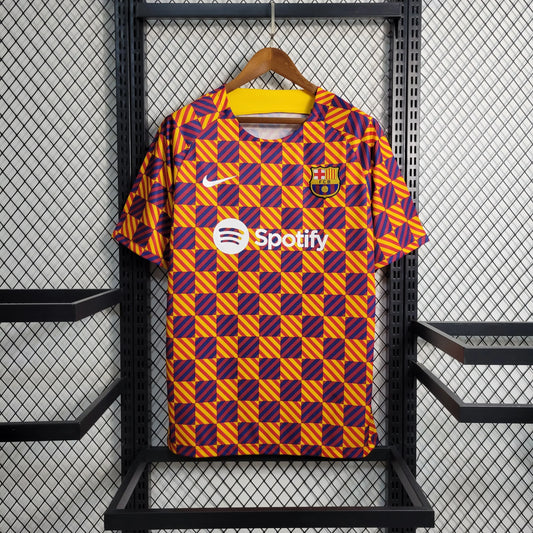 Maillot d'entraînement Barcelone orange bleu et rouge 2023/24 