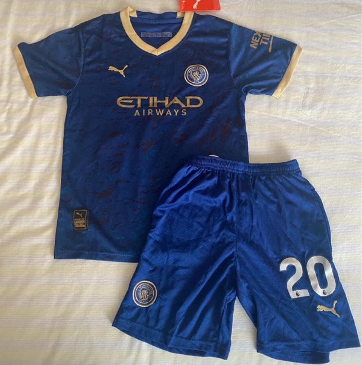 Children's Kit Special Edition Manchester City 2023/24- Size 6/7- Bernanrdo / 20- Item in Stock