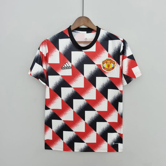 Maillot d'entraînement à motif géométrique Manchester United 2022/23 rouge blanc noir 