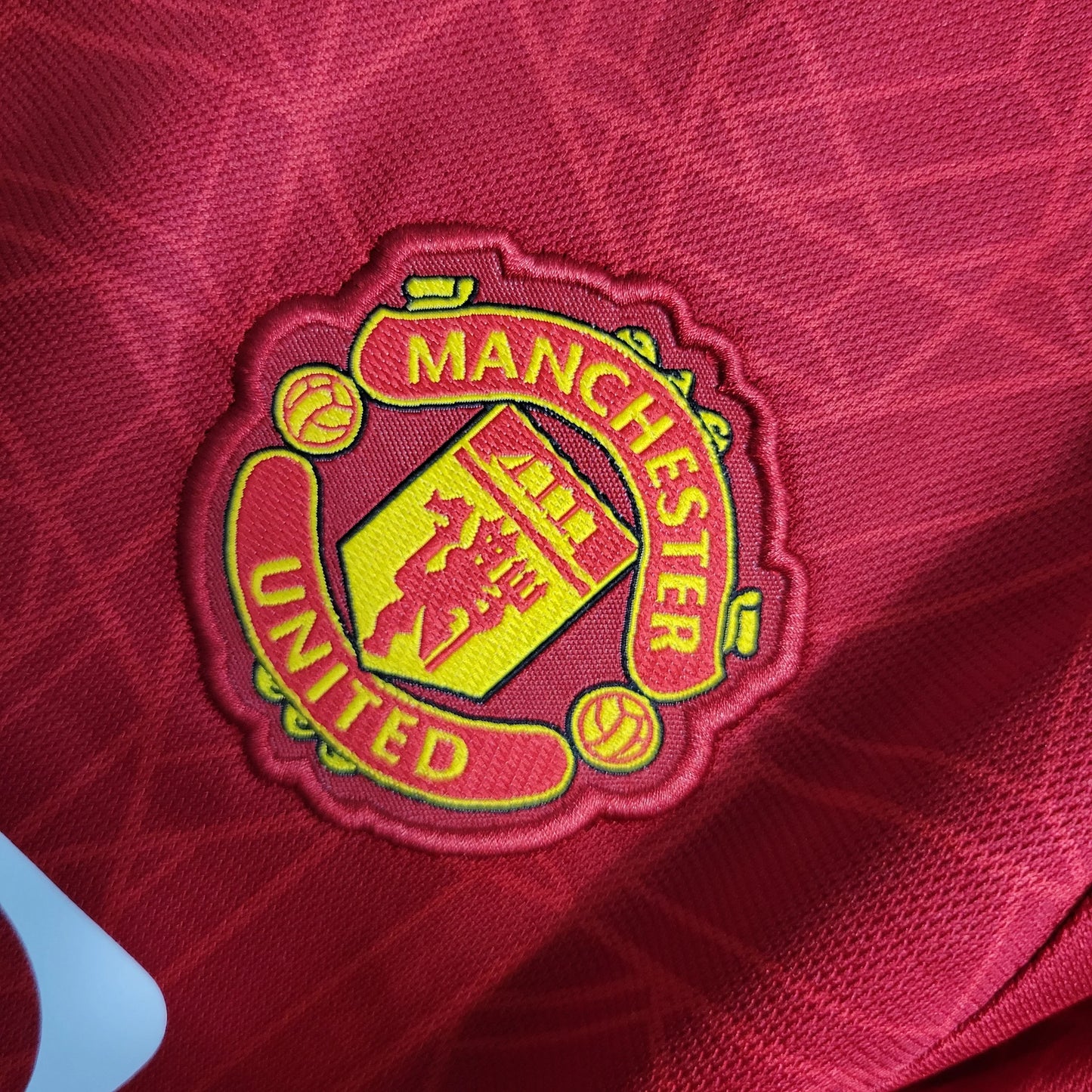 Kit Criança Principal Manchester United Manga Comprida 2023/24